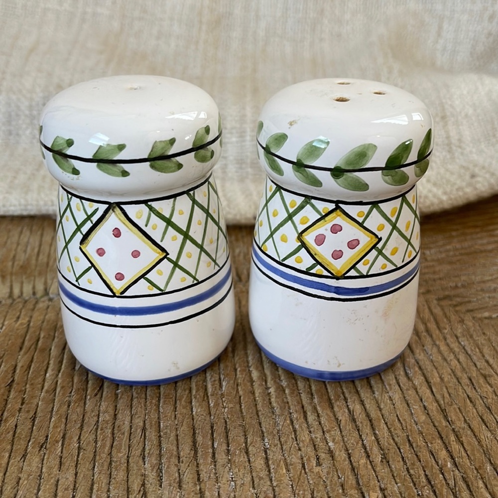 Handpainted pottery salt and pepper shaker set signed and numbered